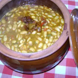 Tasty Beans in a Clay Pot with Peppers
