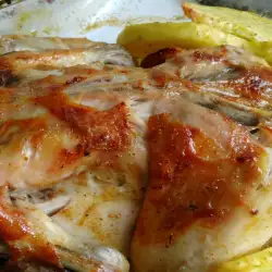 Whole Chicken with Potatoes in the Oven