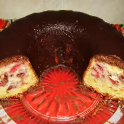 Cake with Strawberries and Chocolate Sauce