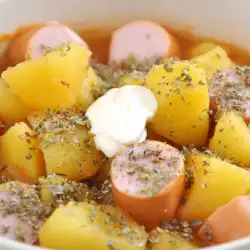 Potatoes with Sausages in a Clay Pot