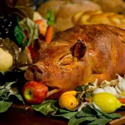 Stuffed Roasted Suckling Pig with Ham and Mushrooms