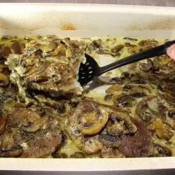 Pork Steaks with Mushrooms and Processed Cheese