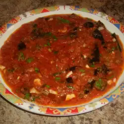 Eggplant with Tomato Sauce and Garlic in a Pan