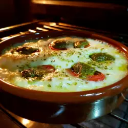 Oven-Baked Provolone Cheese with Cherry Tomatoes and Pesto
