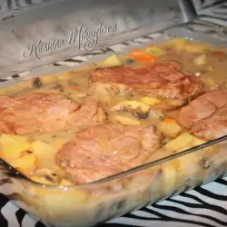 Juicy Steaks with Garlic Potatoes and Mushroom Sauce in the Oven