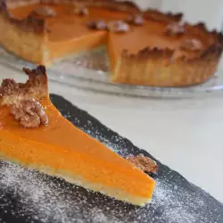 Pumpkin Pie with Cream and Walnuts