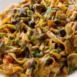 Tagliatelle with Mushrooms, Bacon and Tomato Sauce
