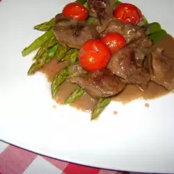 Beef in Sauce with Asparagus and Cherry Tomatoes