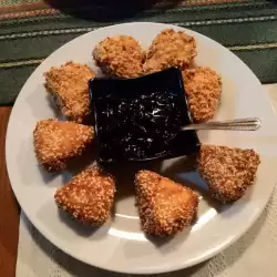 Breaded Processed Cheese Bites with Walnuts and Sesame