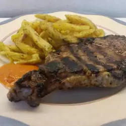 Pork Neck Steaks with Chili Sauce and Fries