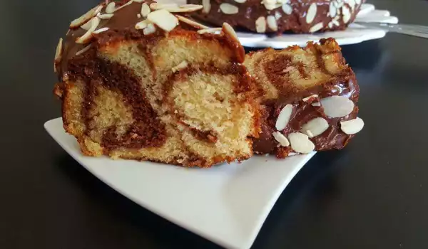 Cake with a Chocolate Glaze and Almonds