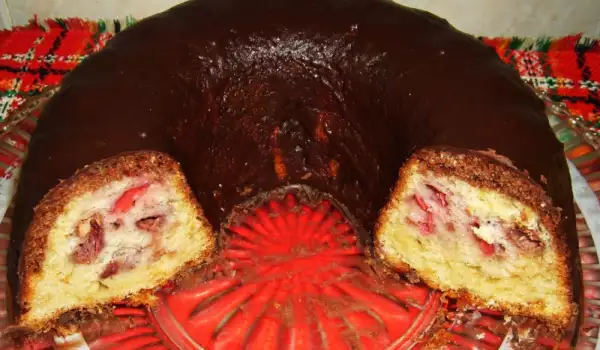 Cake with Strawberries and Chocolate Sauce