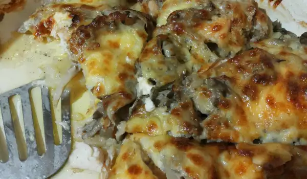 Tasty Oven-Baked Turkey Meat with Mushrooms and Processed Cheese