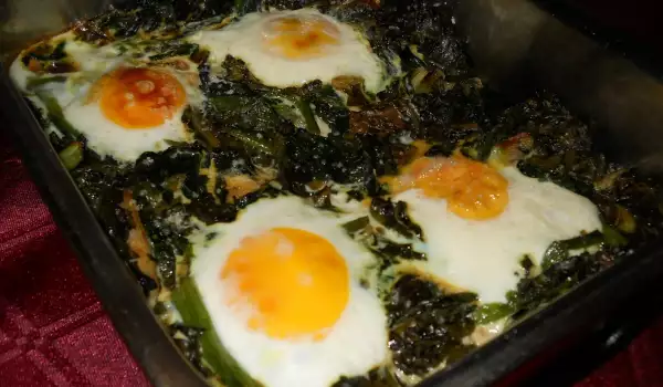 Eggs Sunny Side Up on a Bed of Dock and Spinach