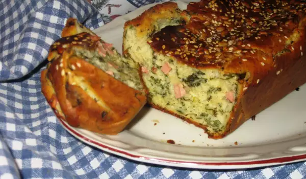 Salty Cake with Dock, Sausages and Seeds