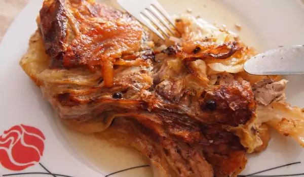 Pork Steaks in Sauerkraut Leaves