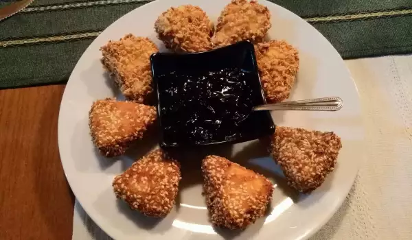 Breaded Processed Cheese Bites with Walnuts and Sesame
