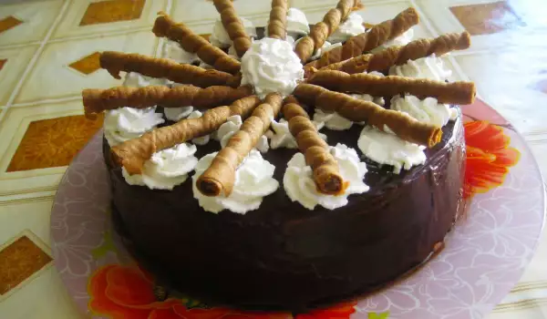 Cake with Chocolate Mousse and Wafer Rolls